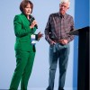 City of Orlando CFO Rebecca Sutton with Workday CEO Dave Duffield on stage